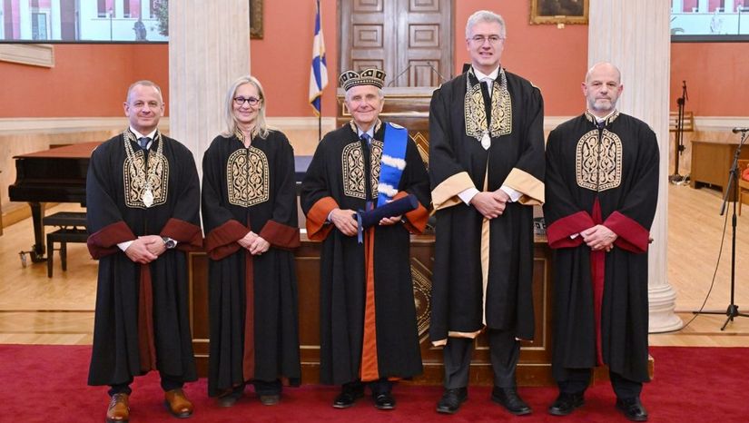 Emeritus Professor Clyde Williams, OBE, Receives the Title of Doctor Honoris Causa of the School of Physical Education and Sport Science